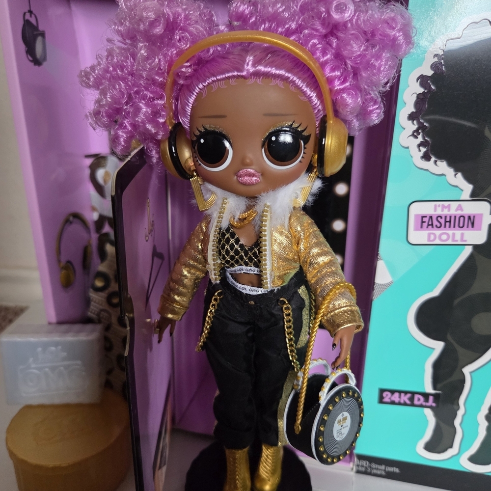 L.O.L. Surprise! 24K DJ. Doll with Purple Curly Hair and Gold Outfit Accents